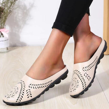 Loose-fitting slippers with a floral cutout, suitable for all foot types